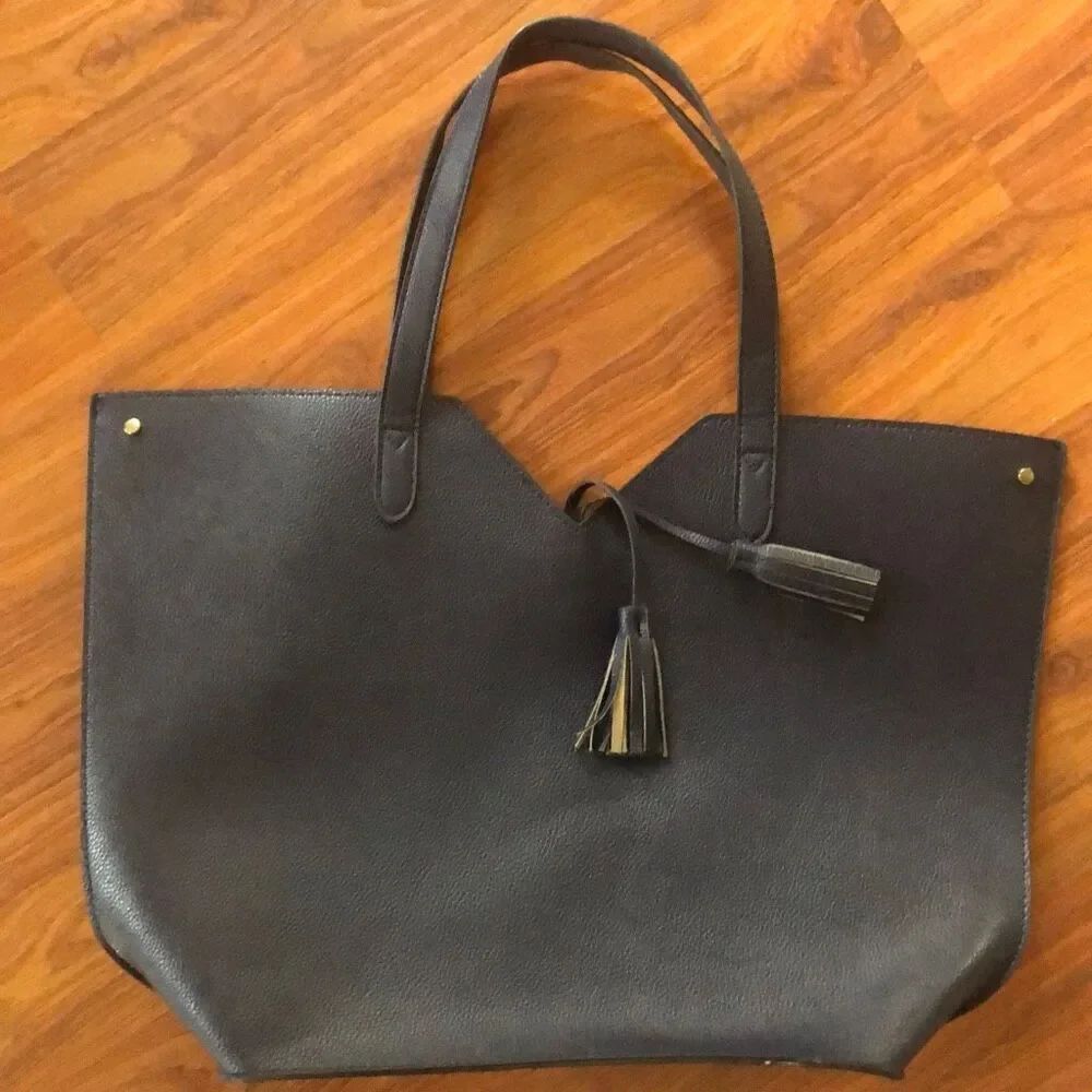 Neiman Marcus navy medium size tote with tassels